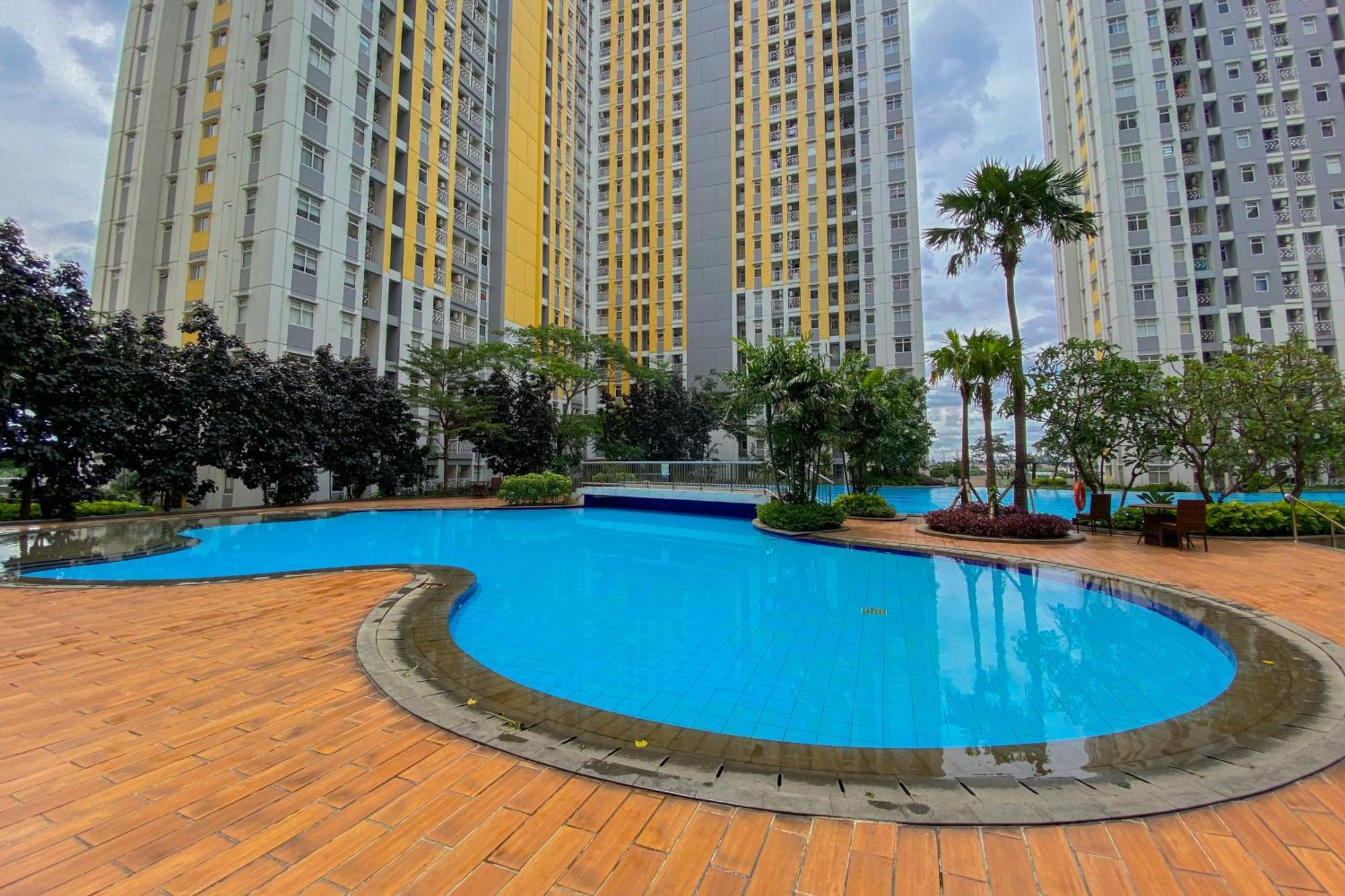 Comfort And Elegant 4br Combined At Springlake Summarecon By Travelio